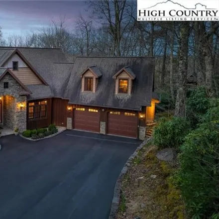 Buy this 4 bed house on 719 Milton Brown Heirs Road in Sorrento Skies, Watauga County
