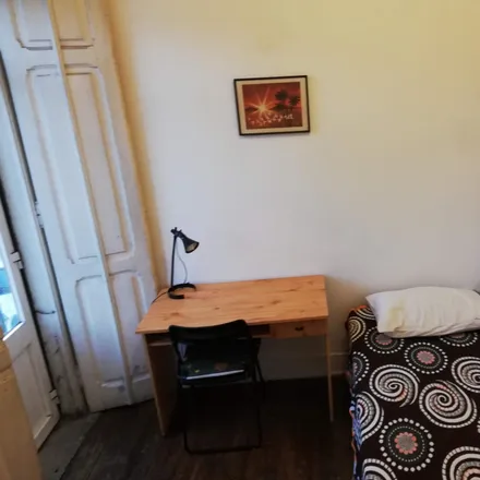 Rent this 5 bed room on Rua Ângela Pinto in 1900-287 Lisbon, Portugal