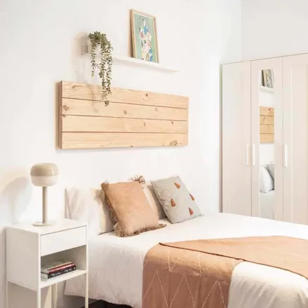 Rent this 7 bed room on Calle de la Flor Alta in 2, 28004 Madrid