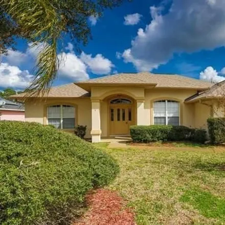 Rent this 3 bed house on 49 Walton Place in Palm Coast, FL 32164