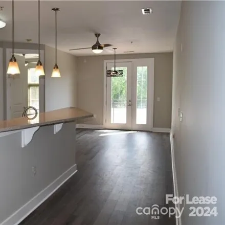 Rent this 2 bed condo on 1101 1st St W Unit 214 in Charlotte, North Carolina