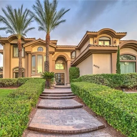 Buy this 6 bed house on TPC Summerlin in 1700 Village Center Circle, Las Vegas