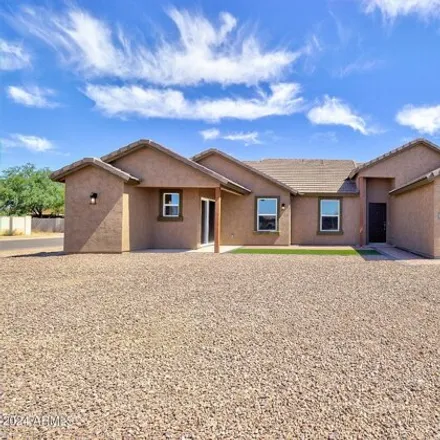 Buy this 4 bed house on 10664 W Arvada Dr in Arizona City, Arizona
