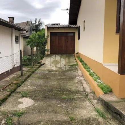 Buy this 3 bed house on Rua Dona Flora in Universitário, Santa Cruz do Sul - RS