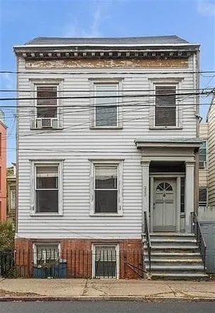 Rent this 3 bed house on 233 Montgomery Street in Jersey City, NJ 07302
