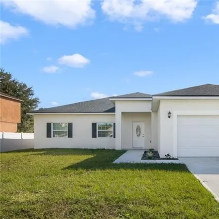 Buy this 4 bed house on 77 Peterlee Court in Poinciana, FL 34758
