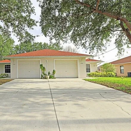 Rent this 2 bed house on 605 Southeast 13th Avenue in Cape Coral, FL 33990