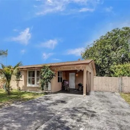 Buy this 3 bed house on 1755 Northwest 27th Avenue in Rock Island, Fort Lauderdale