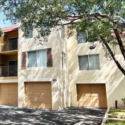 Rent this 2 bed condo on San Marino Boulevard in West Palm Beach, FL 33049