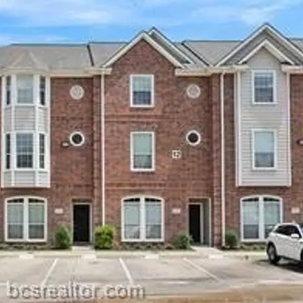 Rent this 4 bed condo on River Oaks Townhomes in Holleman Drive East, College Station
