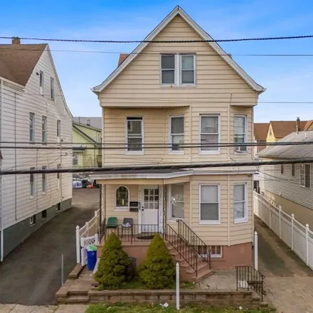 Buy this 6 bed house on 118 Lily Street in Paterson, NJ 07522