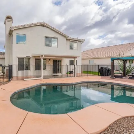 Buy this 4 bed house on 10986 East Fourwing Place in Tucson, AZ 85748