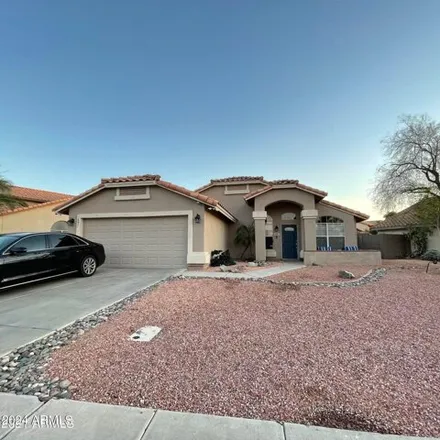 Rent this 4 bed house on 657 West Smoke Tree Road in Gilbert, AZ 85233