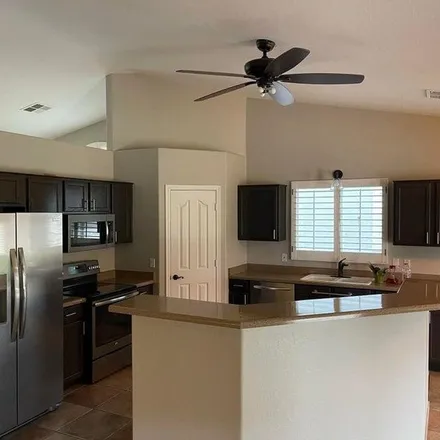 Rent this 4 bed apartment on 11237 East Renfield Avenue in Mesa, AZ 85212