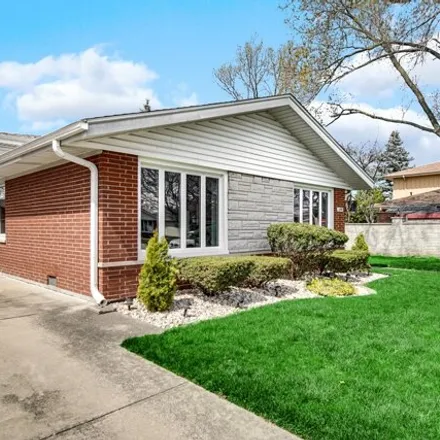 Buy this 4 bed house on 10312 Lockwood Avenue in Oak Lawn, IL 60453
