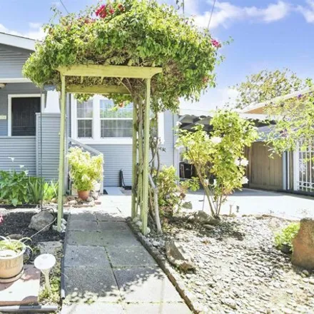 Buy this 4 bed house on 1654 87th Avenue in Oakland, CA 94621
