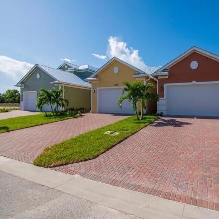 Buy this 2 bed townhouse on 1901 Bridgepointe Circle in Gifford, FL 32967