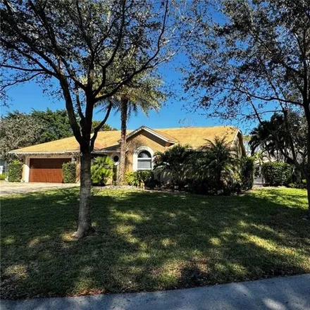Buy this 4 bed house on 5027 Northwest 51st Avenue in Coconut Creek, FL 33073