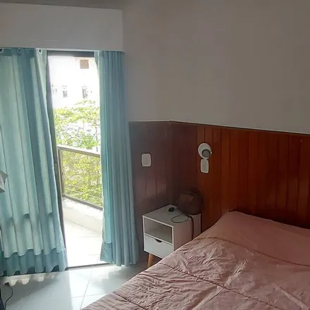 Rent this 3 bed apartment on Guarujá