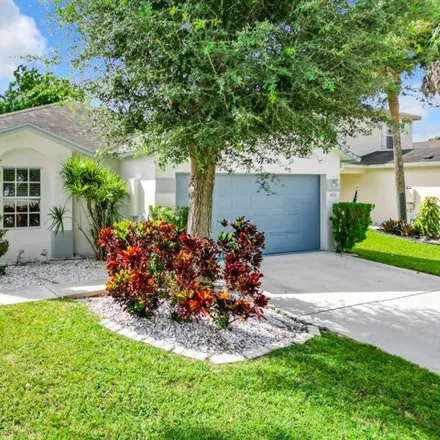 Rent this 3 bed house on 6006 Azalea Circle in Palm Beach County, FL 33415