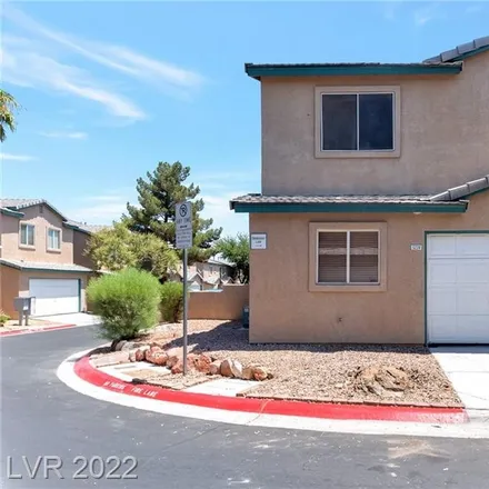 Buy this 2 bed townhouse on 5798 Wind Dancer Drive in Spring Valley, NV 89118