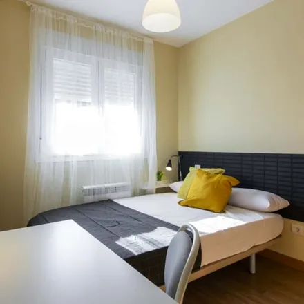 Rent this 1 bed room on Calle de Turaco in 28011 Madrid, Spain