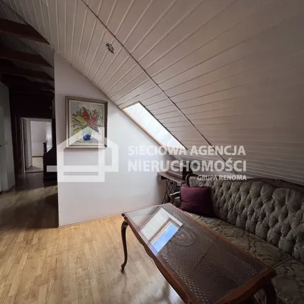 Rent this 12 bed apartment on Rondo Jana Pawła II in Rumia, Poland
