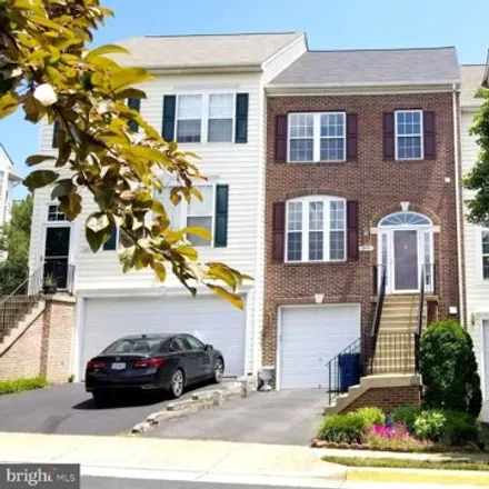 Rent this 3 bed townhouse on 13998 Gill Brook Lane in Centreville, VA 20121