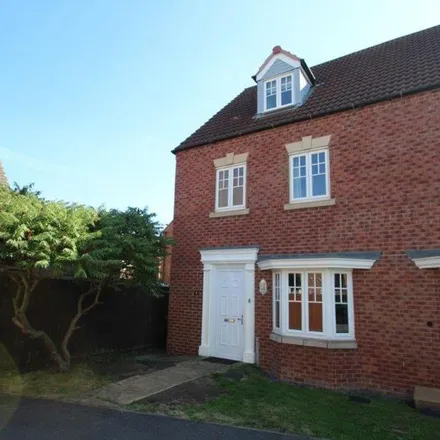 Rent this 4 bed townhouse on Attenborough Close in Wigston, LE18 3PR