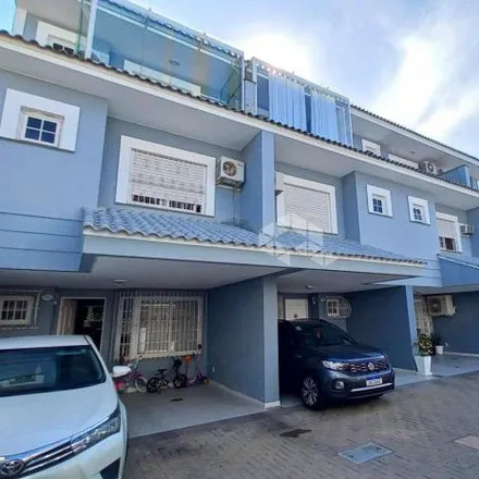 Buy this 4 bed house on Rua Chavantes in Vila Assunção, Porto Alegre - RS