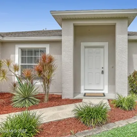 Rent this 3 bed house on 1878 San Filippo Drive Southeast in Palm Bay, FL 32909