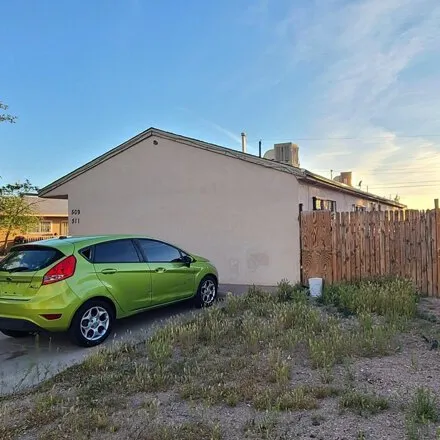 Buy this 4 bed house on 527 Utah Street Southeast in Albuquerque, NM 87108