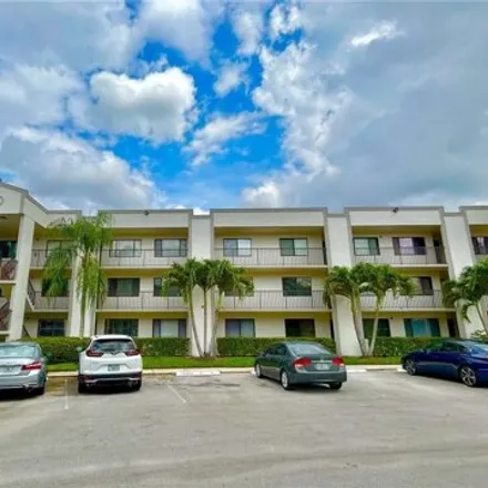 Rent this 2 bed condo on 10356 East Clairmont Circle in Tamarac, FL 33321