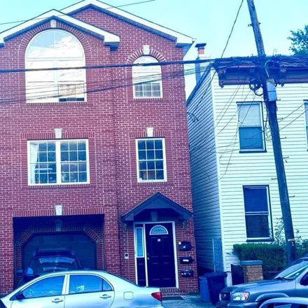 Rent this 3 bed house on 72 Webster Ave Unit 1 in Jersey City, New Jersey