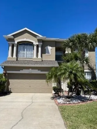 Rent this 5 bed house on 1598 Sun Meadow Drive in Meadow Woods, Orange County