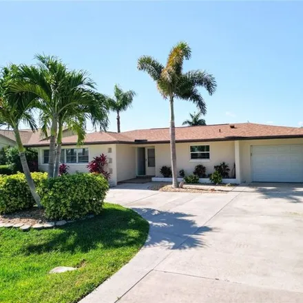 Buy this 3 bed house on 1708 Se 39th Ter in Cape Coral, Florida