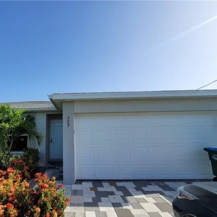 Rent this 3 bed house on 321 Southwest 47th Terrace in Cape Coral, FL 33914