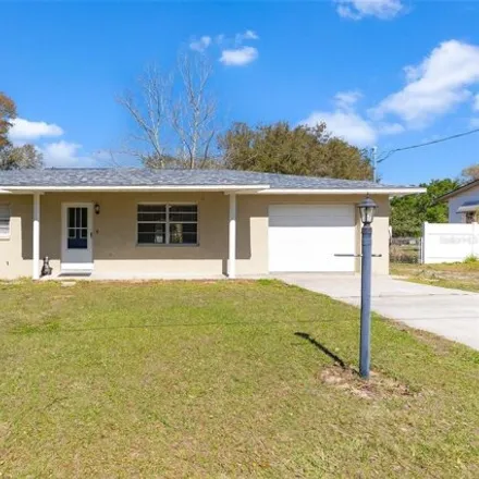 Buy this 2 bed house on 413 1st Drive in Lady Lake, FL 32159