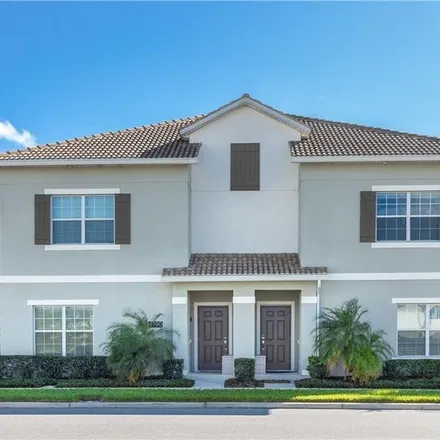 Buy this 4 bed townhouse on 3295 Tower Court West in Kissimmee, FL 34741