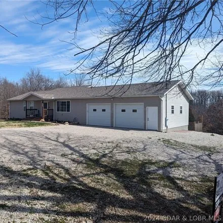 Buy this 4 bed house on 204 Sunflower Lane in Camden County, MO 65020