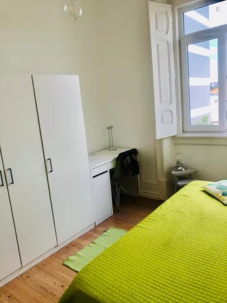 Rent this 4 bed room on Avenida Manuel da Maia 13 in 1000-046 Lisbon, Portugal