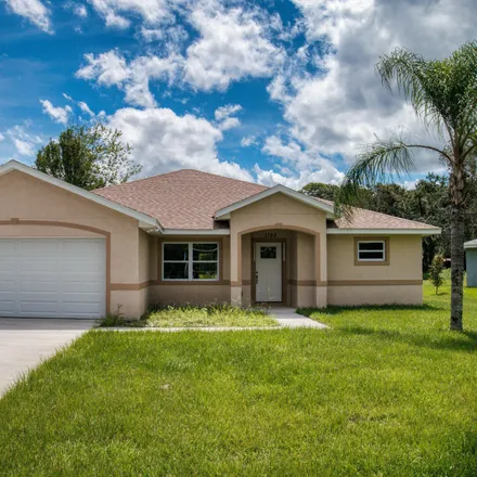 Buy this 3 bed house on 1103 Walter Street in New Smyrna Beach, FL 32168