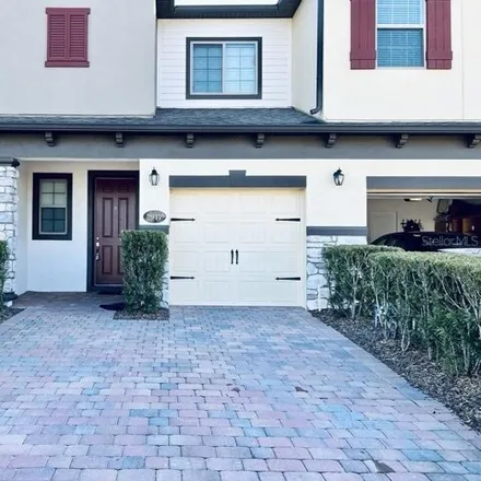 Rent this 3 bed townhouse on 2917 Econ Landing Boulevard in Orange County, FL 32825