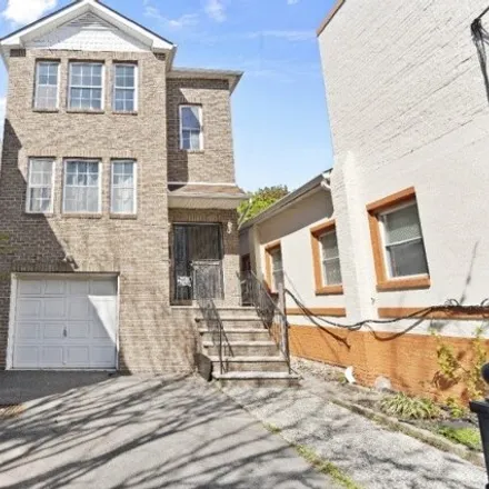 Buy this 6 bed house on 35 Tillinghast Street in Newark, NJ 07108