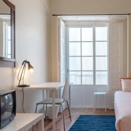 Rent this 4 bed room on Rua Damasceno Monteiro 59 in 1170-108 Lisbon, Portugal