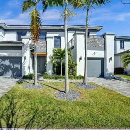 Buy this 6 bed house on 10495 South Lago Vista Circle in Parkland, FL 33076