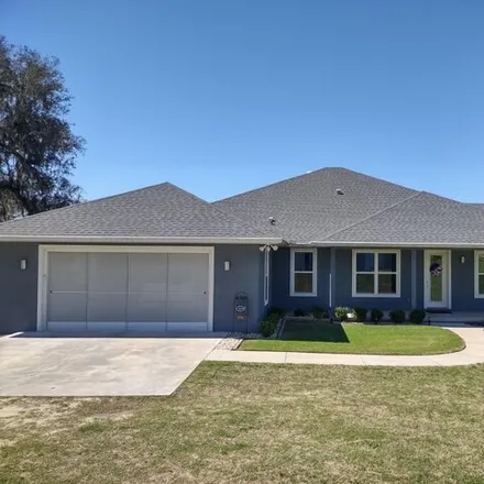 Buy this 3 bed house on Northwest 222 Lane in Alachua County, FL