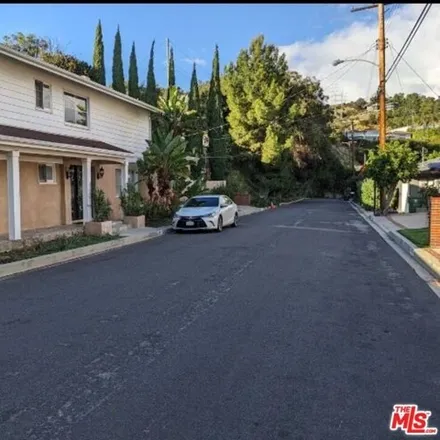 Rent this 4 bed house on 905 Teakwood Road in Los Angeles, CA 90049