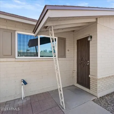 Buy this 4 bed house on 3125 South Dromedary Drive in Tempe, AZ 85282