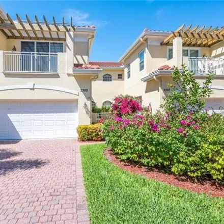 Buy this 2 bed condo on L Ambiance Circle in Pelican Bay, FL